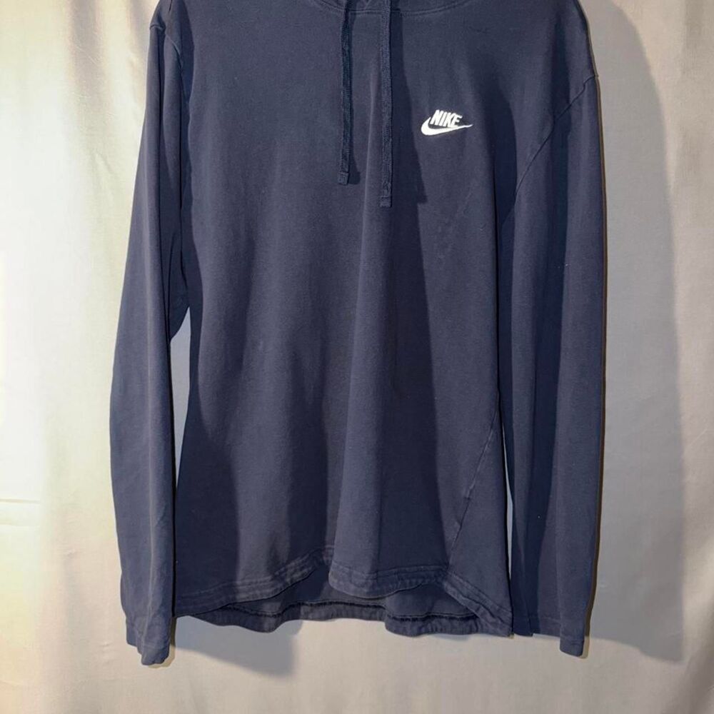 Navy blue Nike hoodie with white embroidered logo
